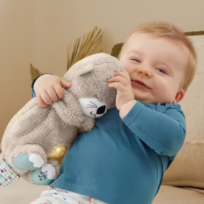 Adorable toy mimics a real sleeping baby .